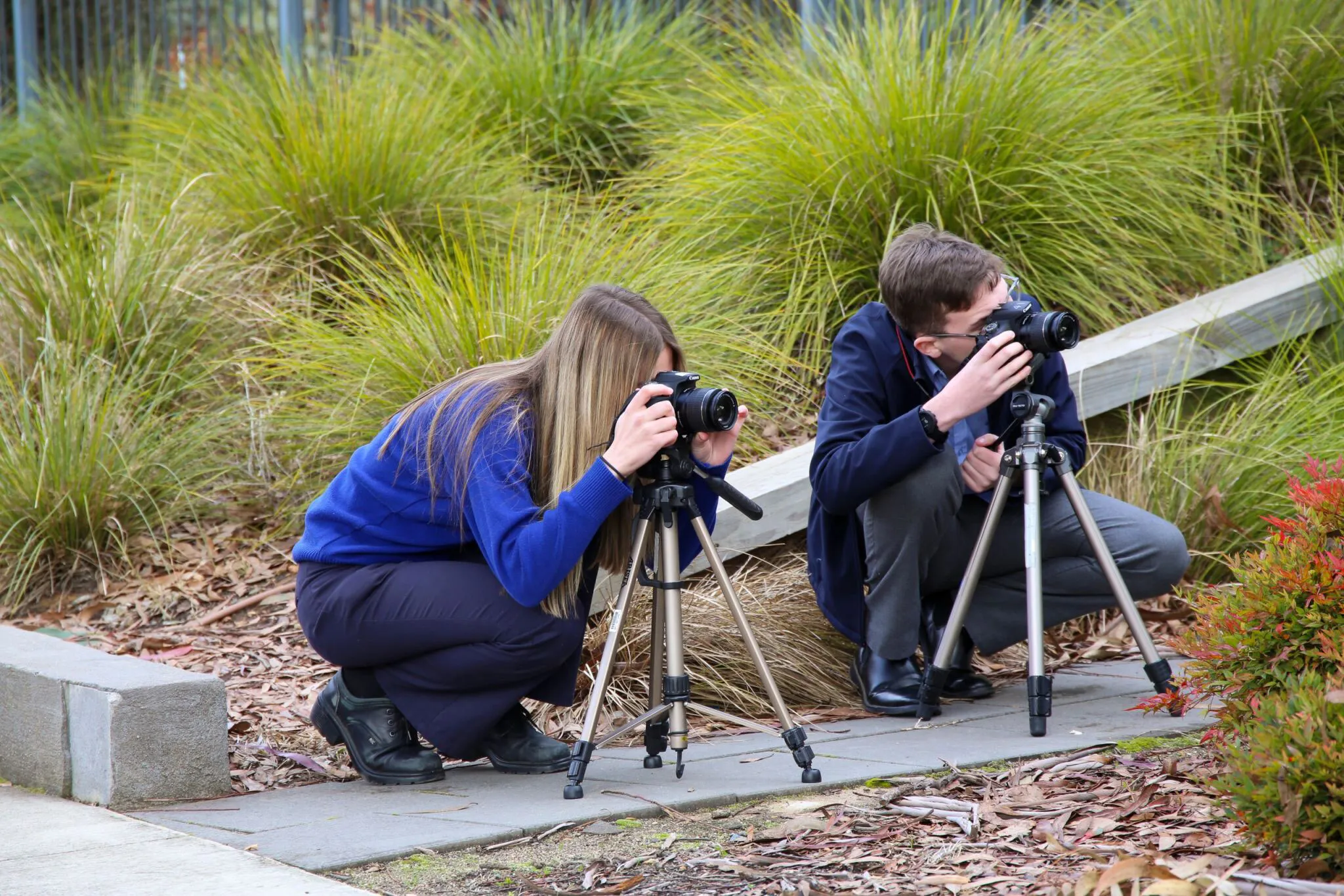 Two students doing photography