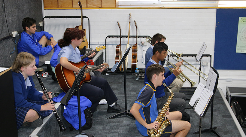 Students rehearsing for the school musical